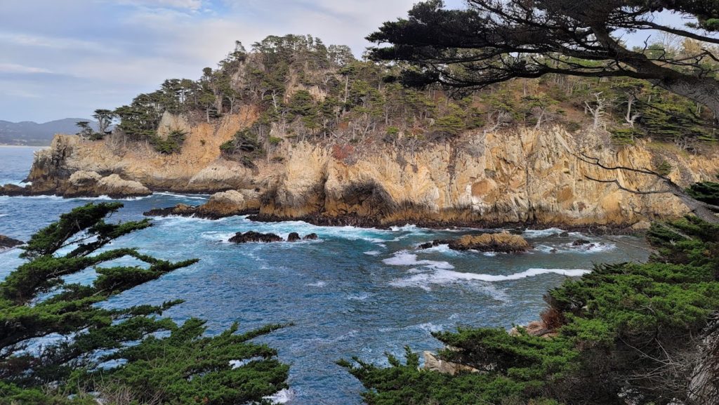 Point Lobos, rocks, blue water, white foam, green trees